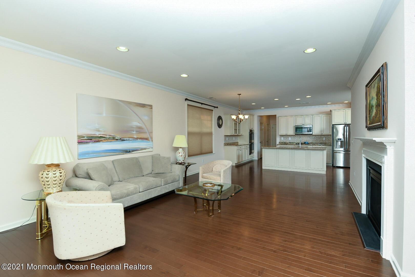 33 Comtois Road Manalapan, NJ 07726 - Photo 7 of 26 a living room with furniture and a kitchen