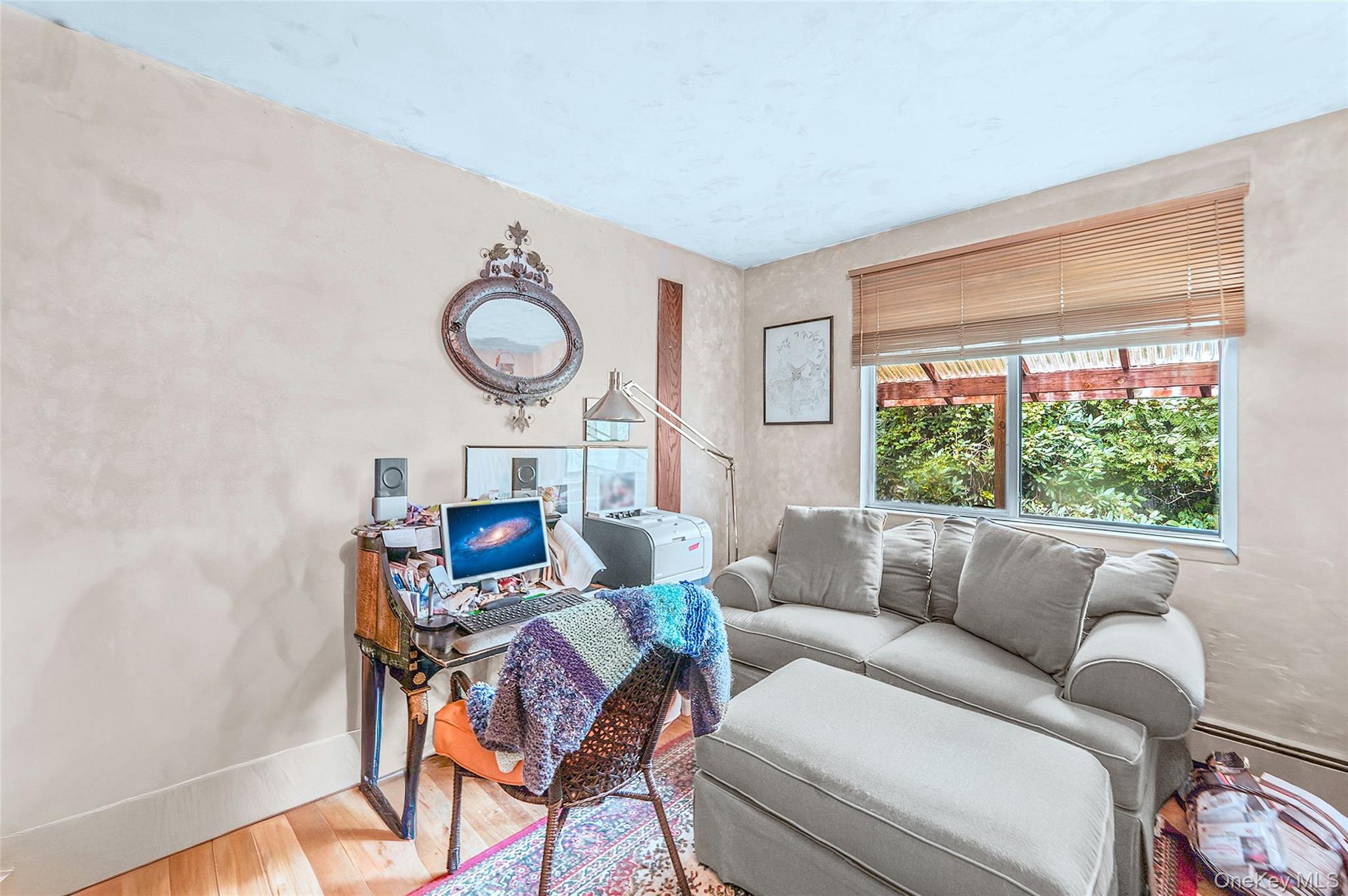 271 Bread And Cheese Hollow Road Northport, NY 11768 - Photo 22 of 32 a living room with furniture and a window