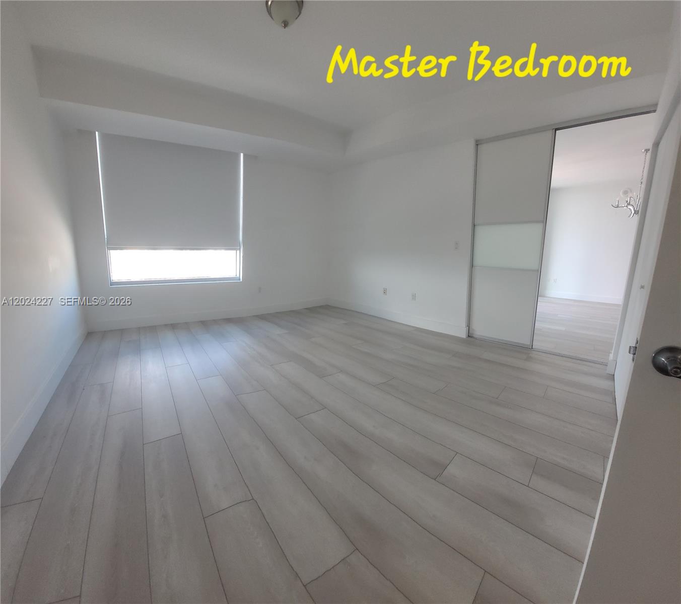 90 Southwest 3rd Street, Unit 2208 Miami, FL 33130 - Photo 20 of 56 a view of an entryway with wooden floor