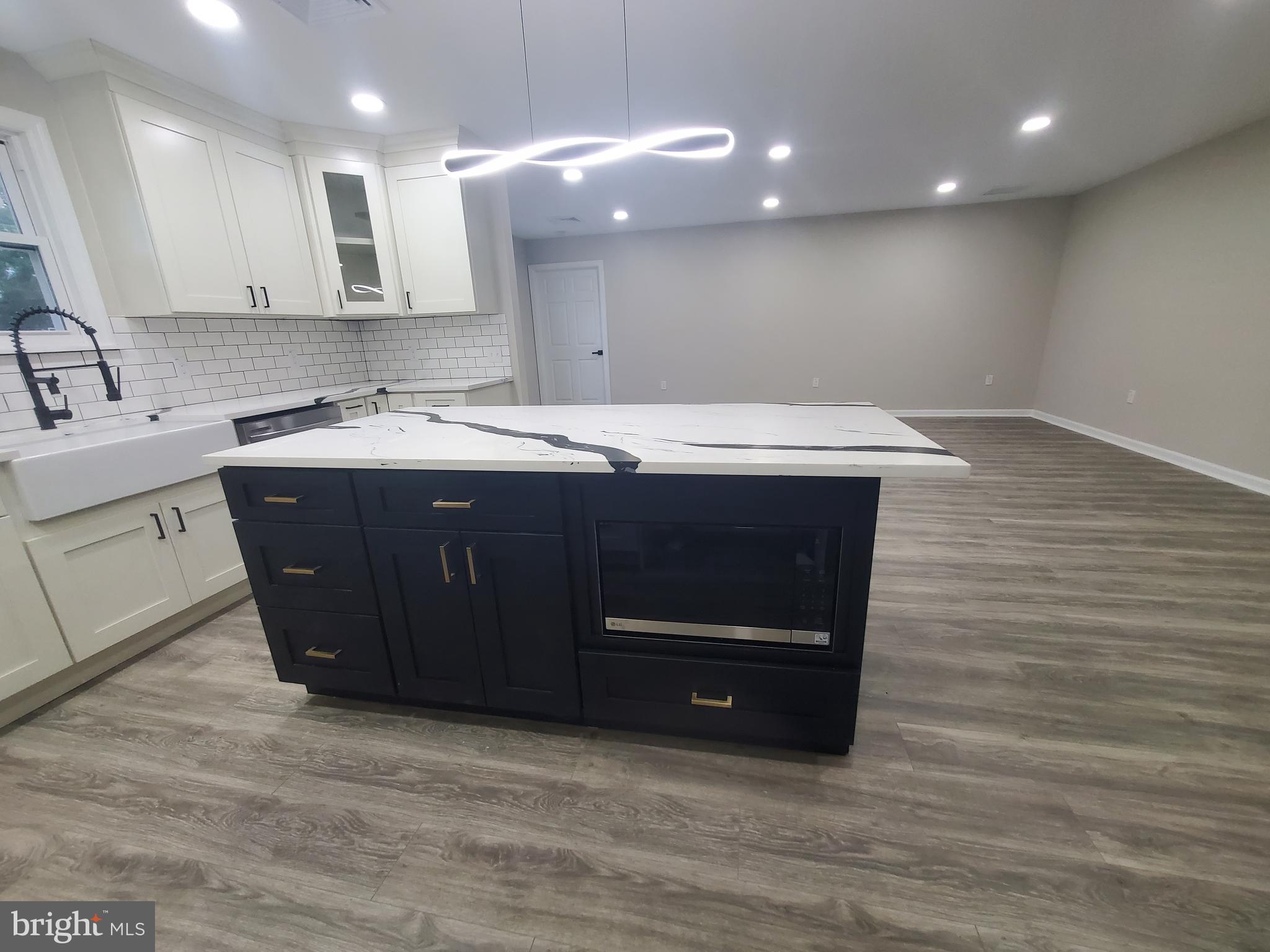 38 Stagecoach Road Southampton, NJ 08088 - Photo 3 of 23 a kitchen with a sink and cabinets