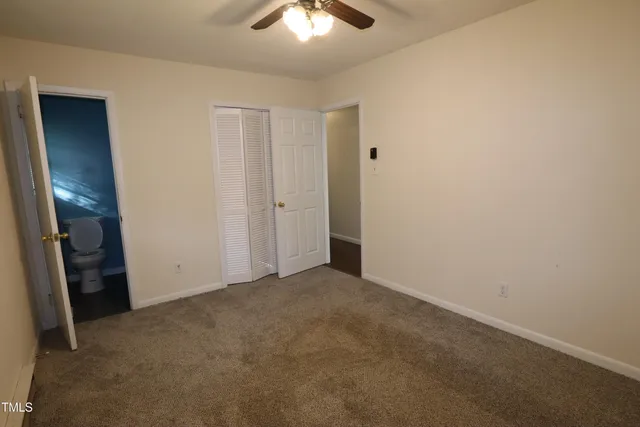 an empty room with a hallway