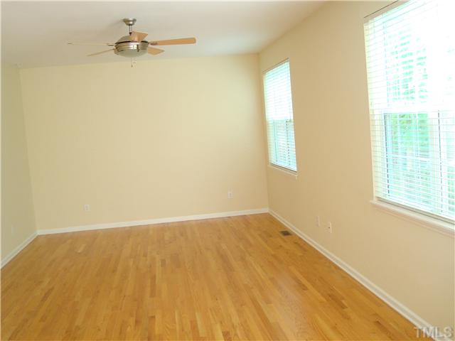 2332 Spruce Shadows Lane Raleigh, NC 27614 - Photo 3 of 11 an empty room with a window