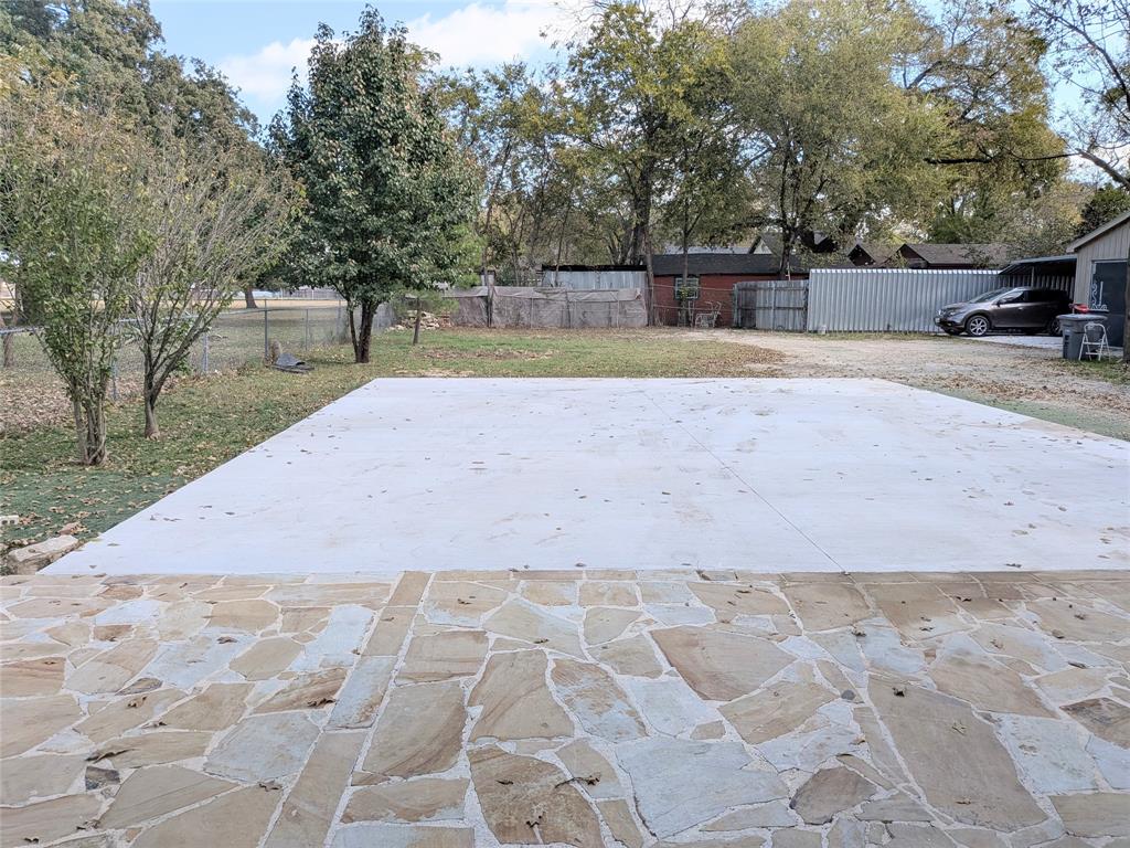 608 Holcomb Road Dallas, TX 75217 - Photo 21 of 23 a view of a yard