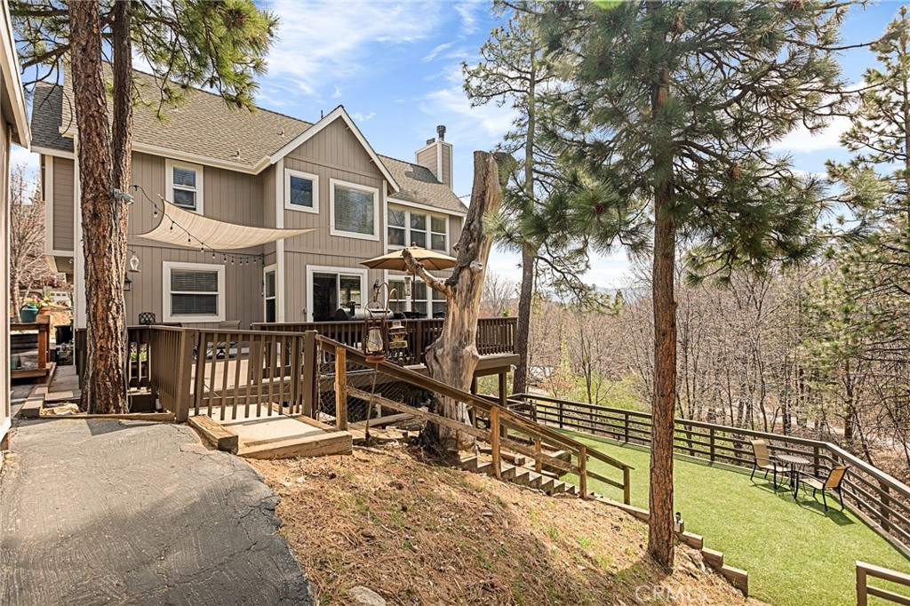 28111 Grenoble Drive Lake Arrowhead, CA 92352 - Photo 2 of 40 a view of a building with a large tree