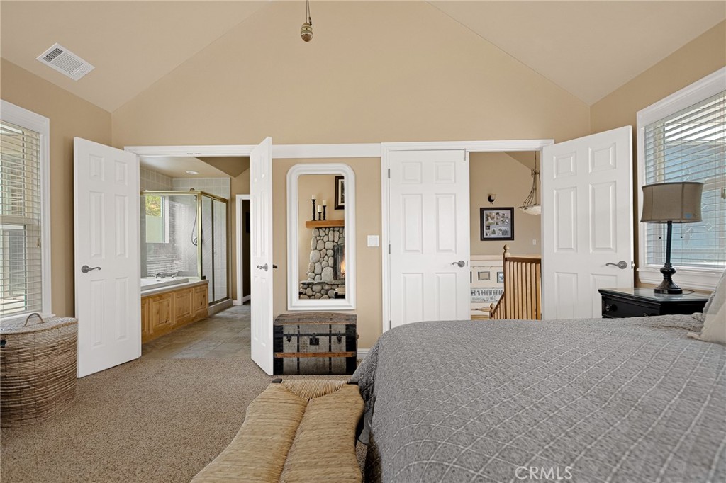 28111 Grenoble Drive Lake Arrowhead, CA 92352 - Photo 25 of 40 a bedroom with a bed and a couch