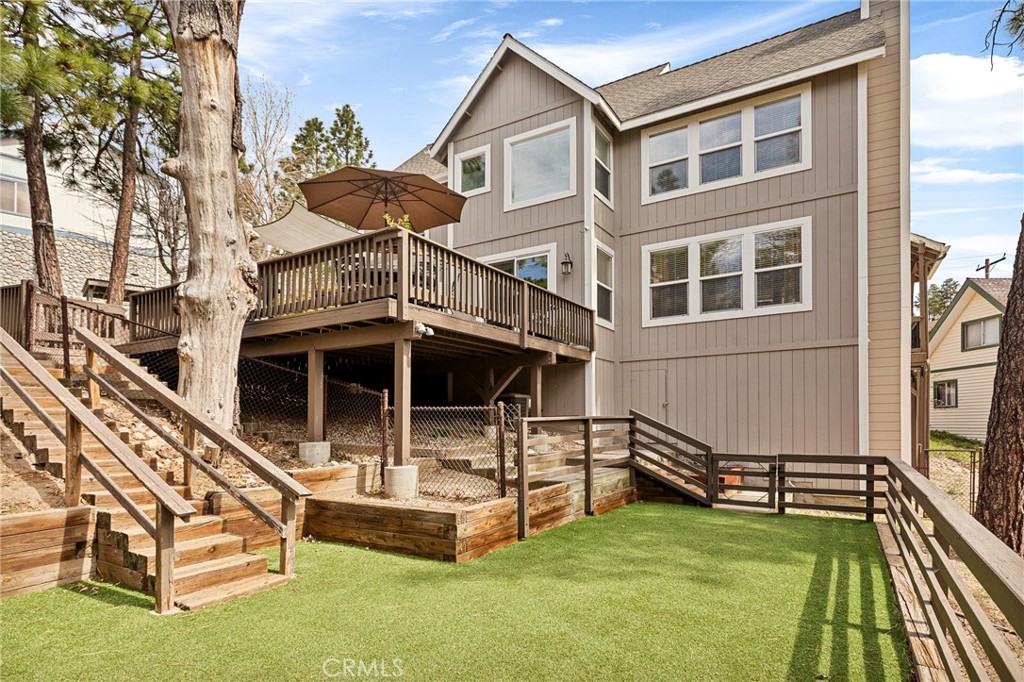 28111 Grenoble Drive Lake Arrowhead, CA 92352 - Photo 37 of 40 a view of a house with pool and chairs