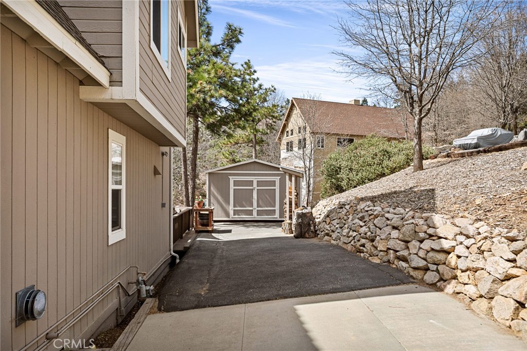 28111 Grenoble Drive Lake Arrowhead, CA 92352 - Photo 38 of 40 a view of a house with a patio