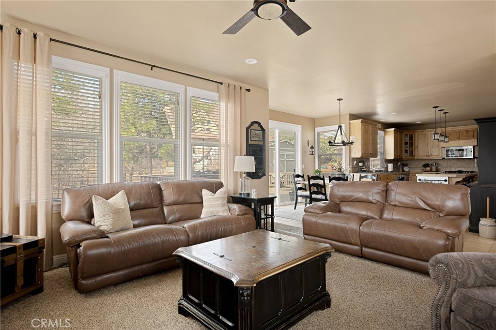 28111 Grenoble Drive Lake Arrowhead, CA 92352 - Photo 4 of 40 a living room with furniture and a large window