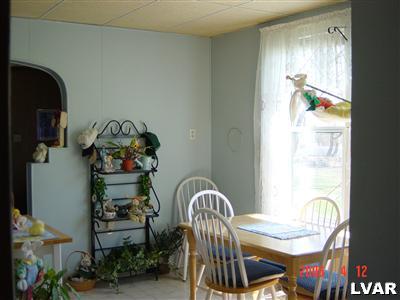 3021 Penn Allen Road Nazareth, PA 18064 - Photo 3 of 8 a view of a dining room with furniture and wooden floor