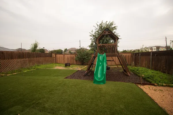 a view of a park with a slide