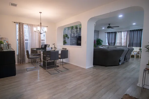 a view of a livingroom with furniture and windows