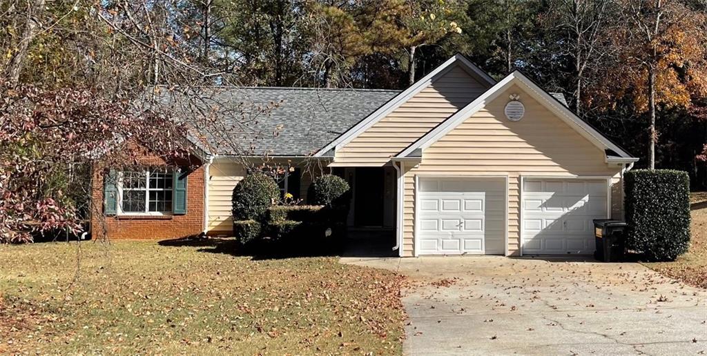 275 Summerfield Crossing Acworth, GA 30101 - Photo 1 of 30 a front view of a house with a yard