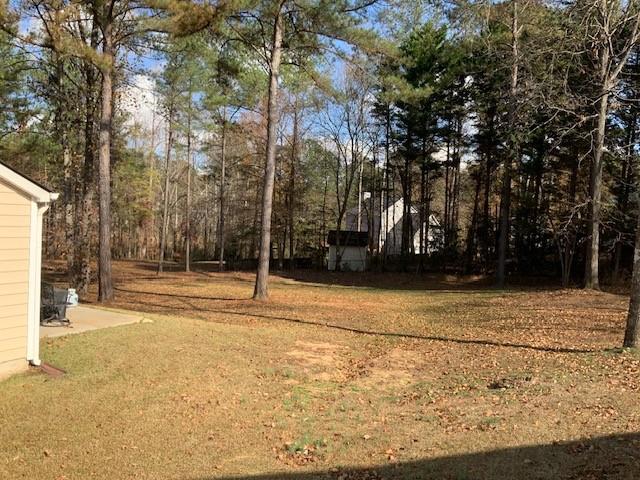 275 Summerfield Crossing Acworth, GA 30101 - Photo 25 of 30 a view of pool and trees in the background