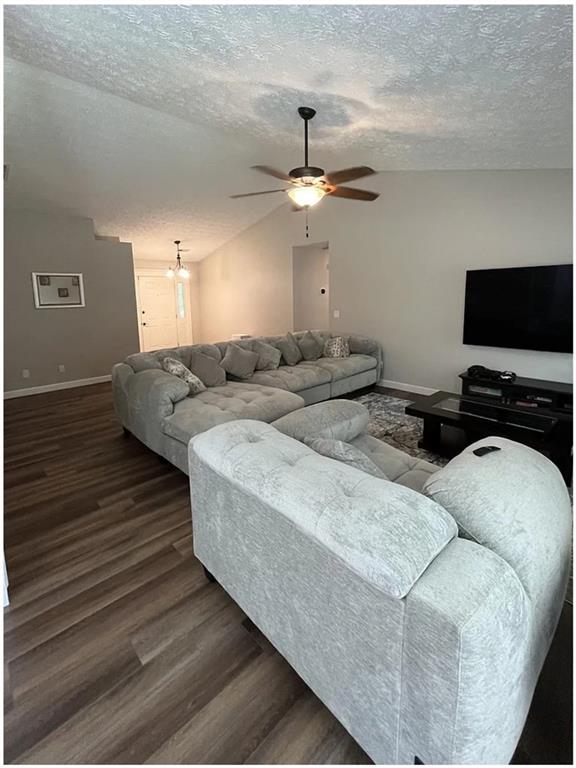 275 Summerfield Crossing Acworth, GA 30101 - Photo 9 of 30 a living room with furniture and a flat screen tv