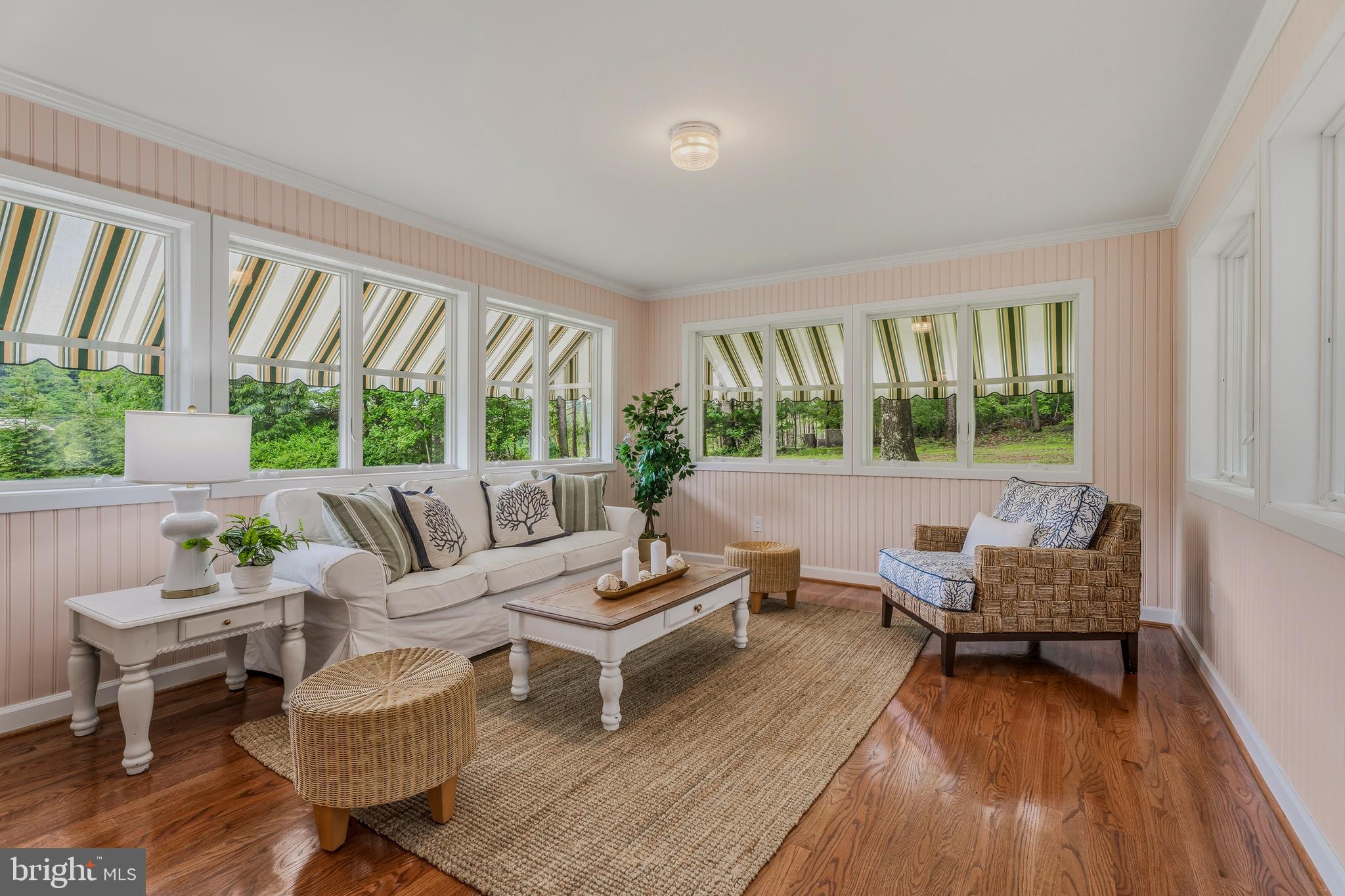 2425 Albert Rill Road Hampstead, MD 21074 - Photo 22 of 44 a living room with furniture and a wooden floor