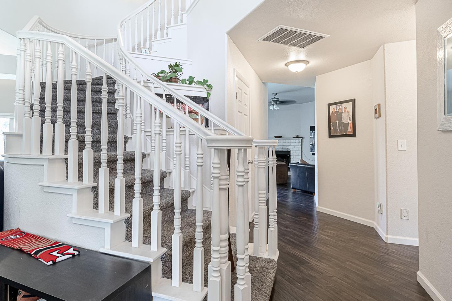 2413 Boston Way Modesto, CA 95355 - Photo 3 of 24 a living room with furniture and wooden floor
