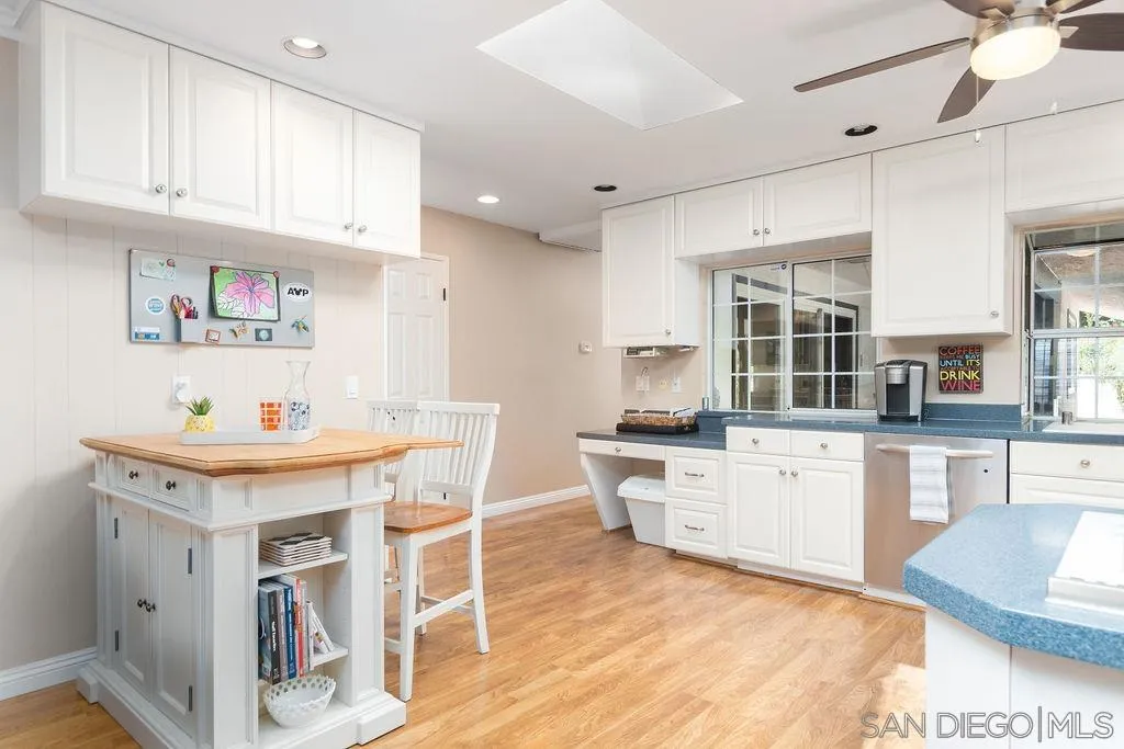 10750 Anaheim Drive La Mesa, CA 91941 - Photo 13 of 34 a kitchen with granite countertop a sink appliances counter top space and cabinets
