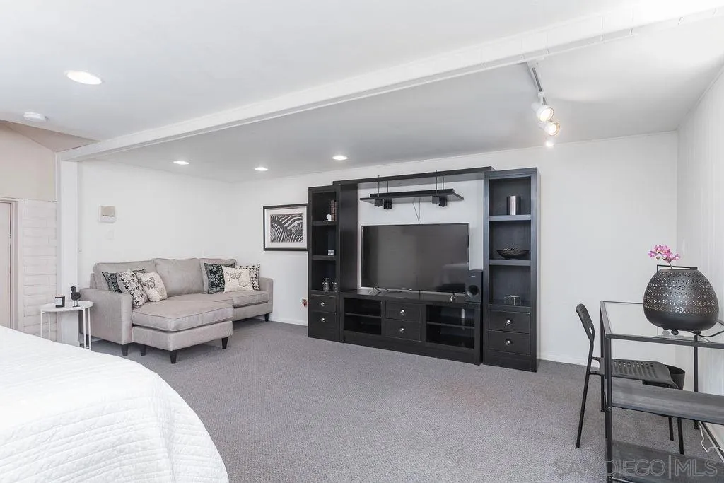 10750 Anaheim Drive La Mesa, CA 91941 - Photo 22 of 34 a living room with furniture and a flat screen tv