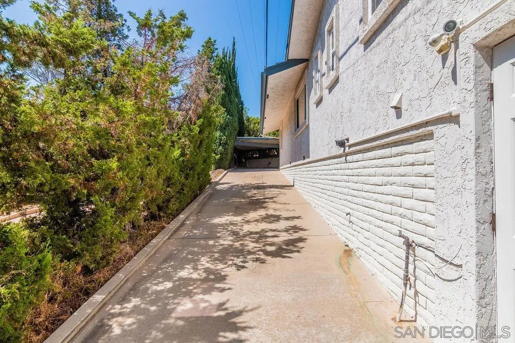 10750 Anaheim Drive La Mesa, CA 91941 - Photo 30 of 34 a view of a pathway of a house with a yard