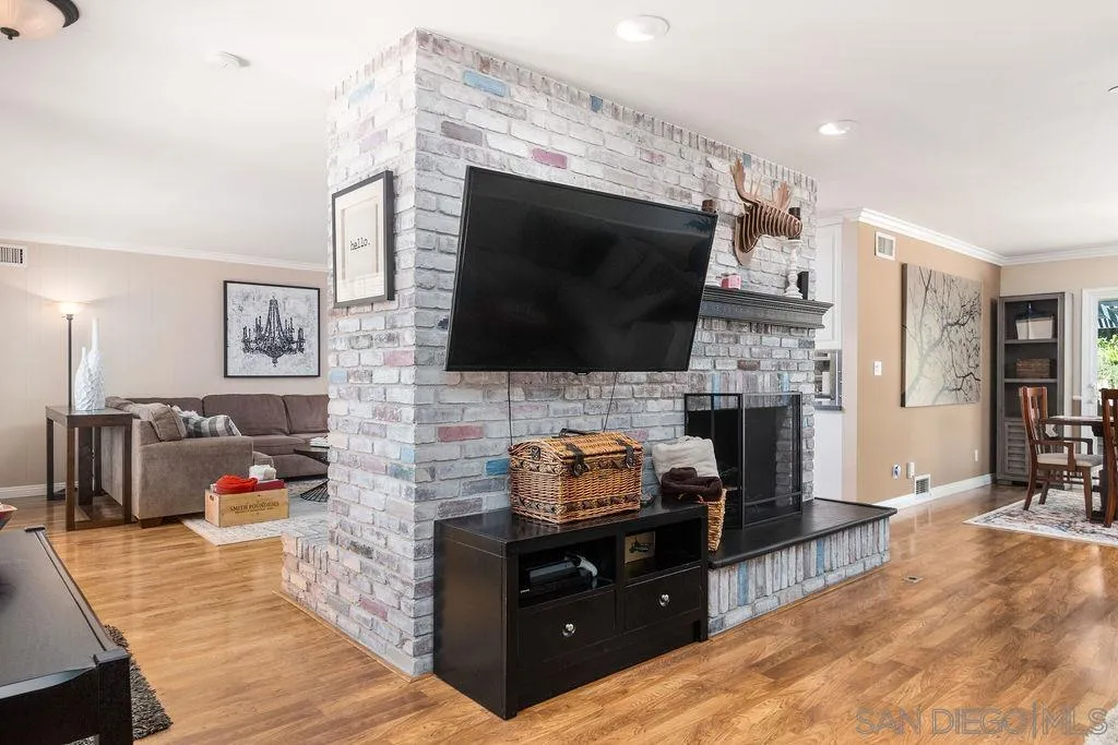 10750 Anaheim Drive La Mesa, CA 91941 - Photo 8 of 34 a living room with fireplace furniture and a flat screen tv