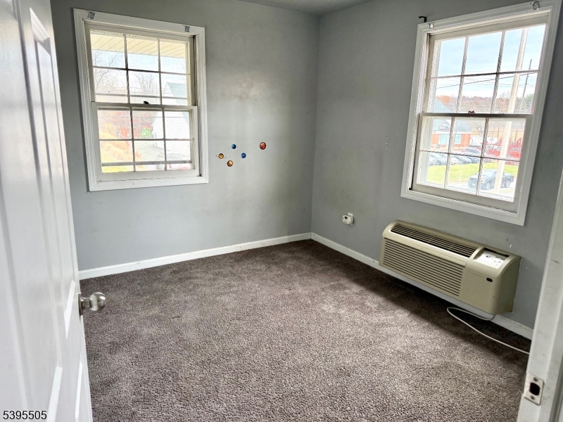 100 Sparta Avenue, Unit 21 Newton, NJ 07860 - Photo 3 of 10 an empty room with a window