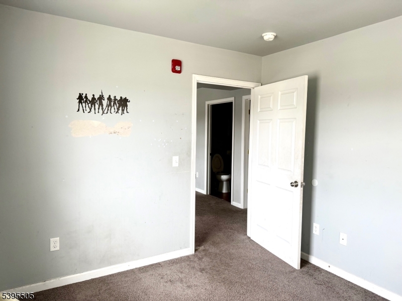 100 Sparta Avenue, Unit 21 Newton, NJ 07860 - Photo 4 of 10 a view of a hallway with a white walls