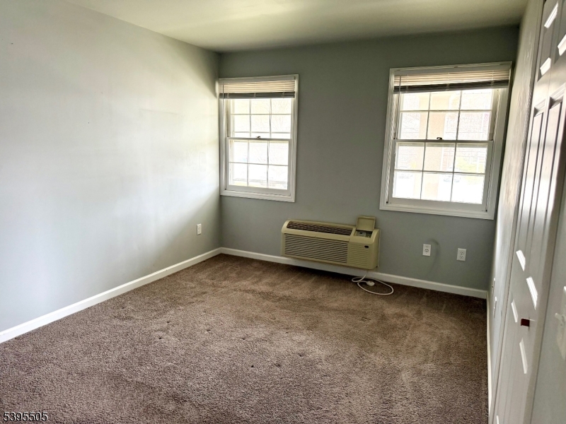 100 Sparta Avenue, Unit 21 Newton, NJ 07860 - Photo 7 of 10 an empty room with a window