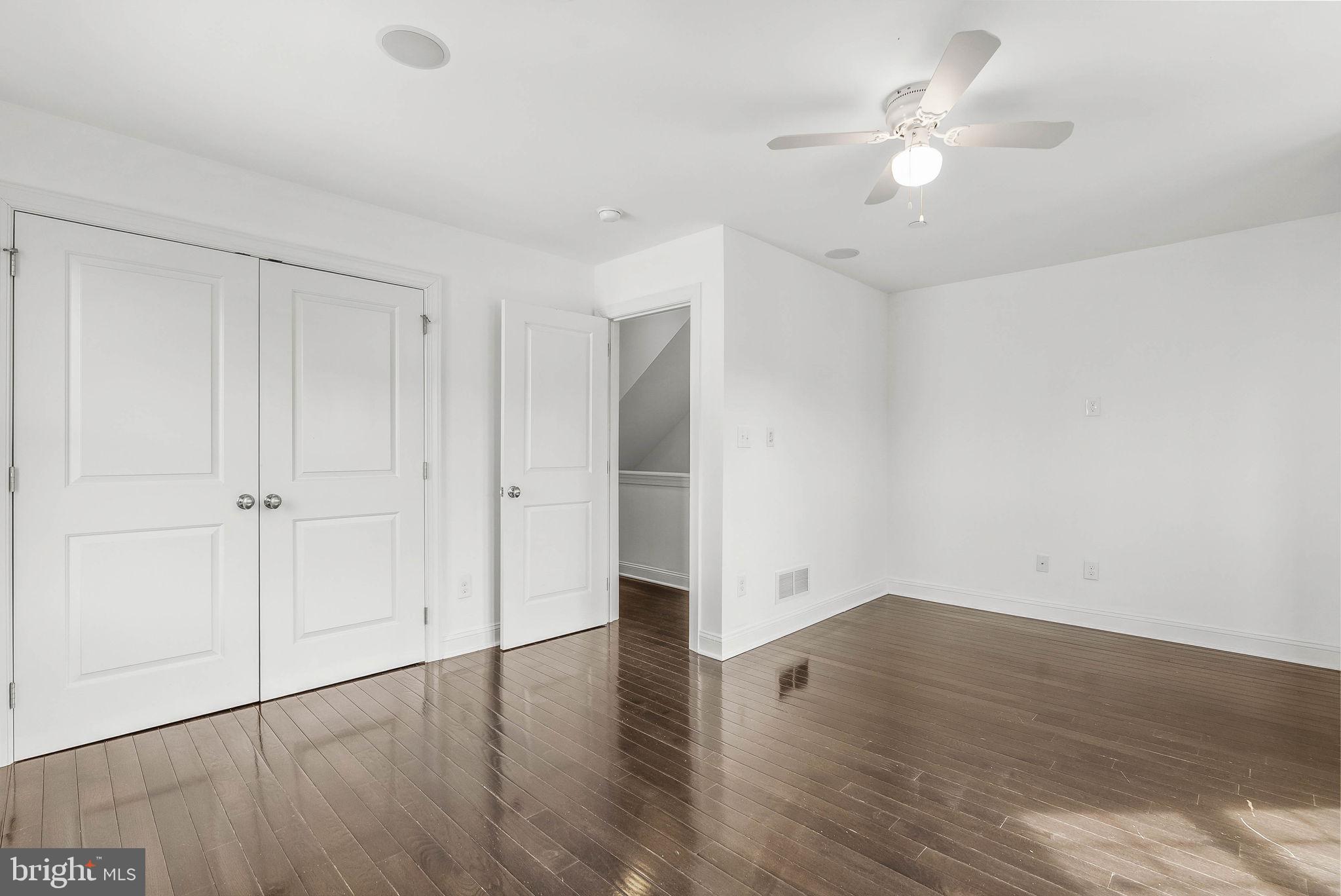 1015 North 3rd Street, Unit H Philadelphia, PA 19123 - Photo 18 of 27 a view of an empty room with wooden floor