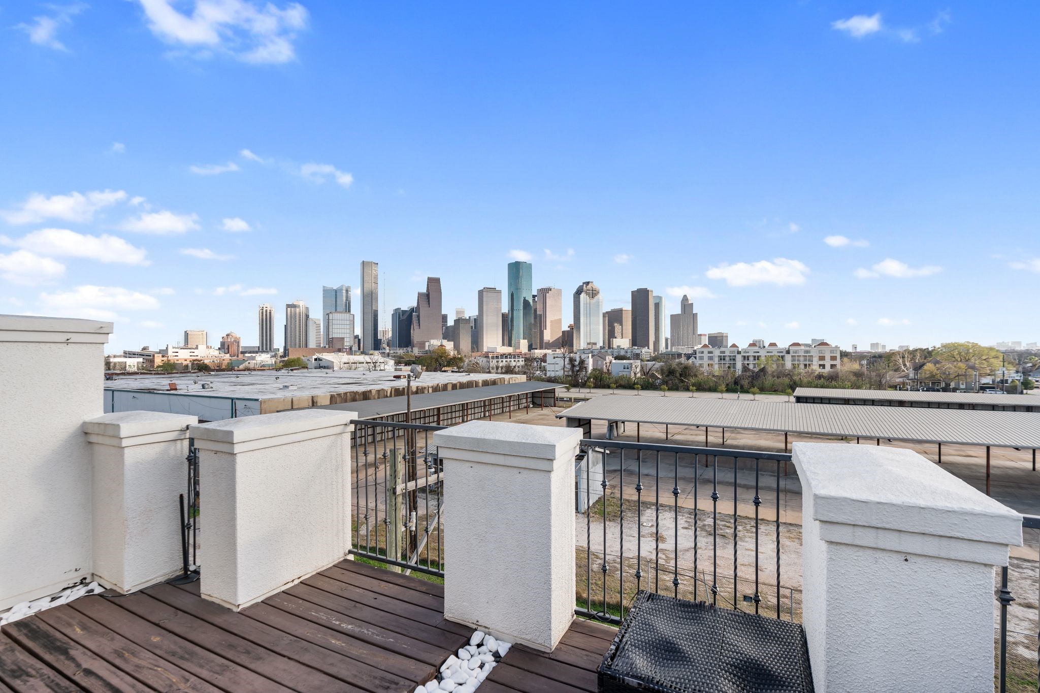 The private rooftop deck offers sweeping downtown views and a front-row seat to Houston’s Fourth of July fireworks.