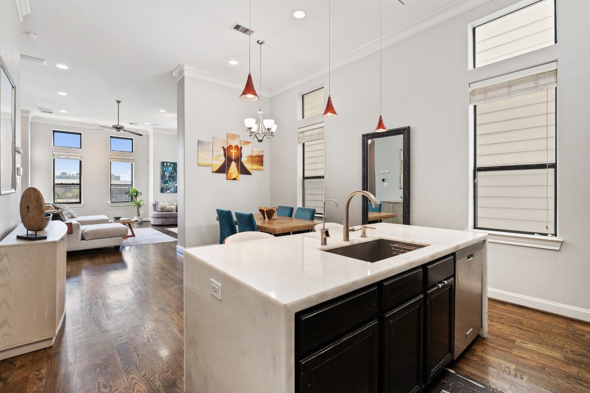 1708 Dart Street Houston, TX 77007 - Photo 11 of 17 The kitchen overlooks the dining area and connects effortlessly to the living room—ideal for gathering and entertaining.