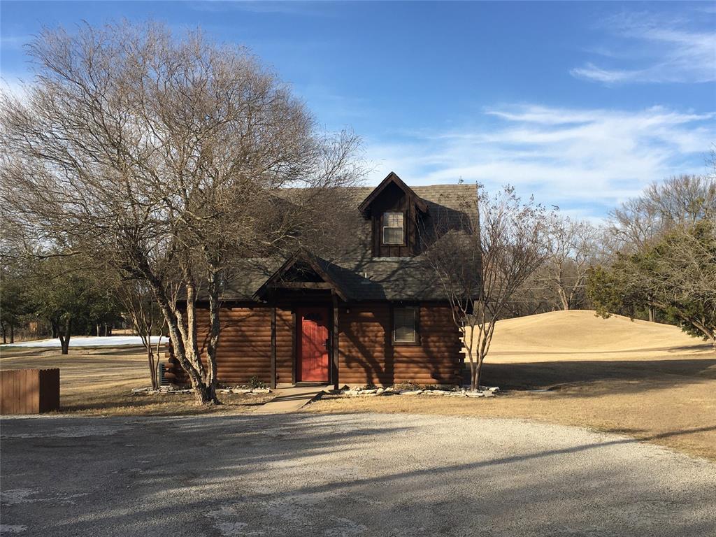 36065 Cedar Ridge Drive Whitney, TX 76692 - Photo 5 of 12 a front view of a house