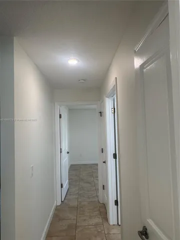 an empty room with an entryway