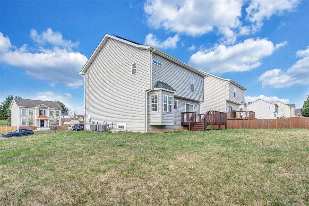 427 Cambridge Ct Road Vinton, VA 24179 - Photo 38 of 46 a view of a house with a yard and sitting area