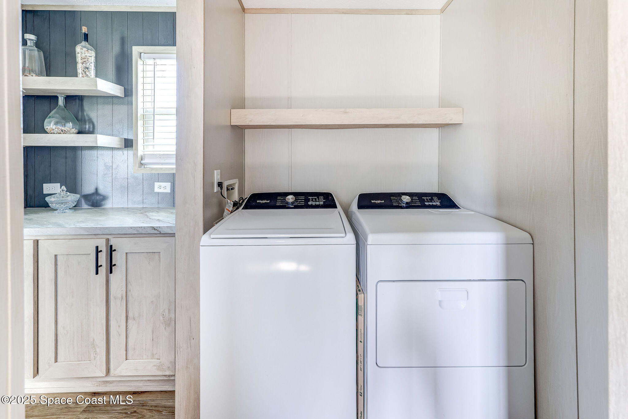 800 Phyllis Way Cocoa, FL 32926 - Photo 14 of 40 a utility room with dryer and washer