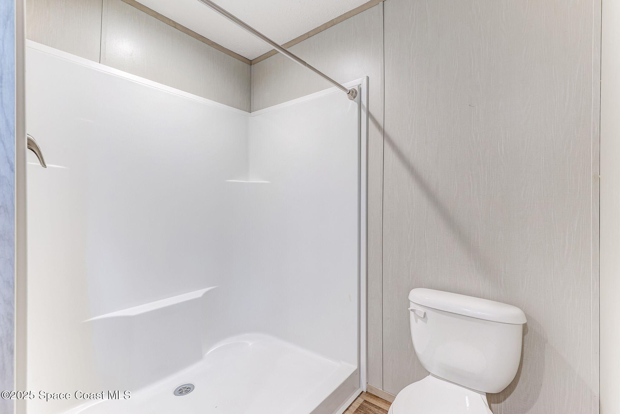 800 Phyllis Way Cocoa, FL 32926 - Photo 22 of 40 a bathroom with a toilet and a shower