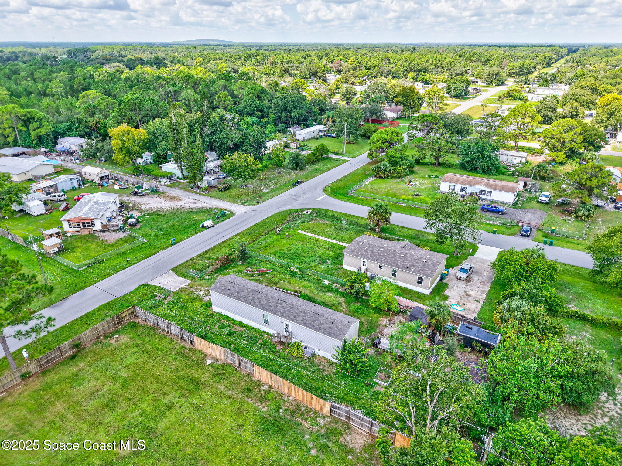 800 Phyllis Way Cocoa, FL 32926 - Photo 32 of 40 a view of a yard with an outdoor space