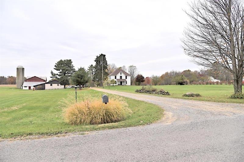 207 Mc Ewen Road Mercer, PA 16137 - Photo 1 of 23 Beautiful setting out in the country in Mercer, close to 79/80. 12 acres, organic blueberries, barn for cows or horses, outbuilding for storage and spring and spring house.