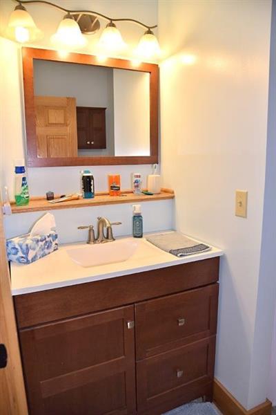 207 Mc Ewen Road Mercer, PA 16137 - Photo 14 of 23 Upstairs bath is updated with new cabinet, tub/shower, and flooring.