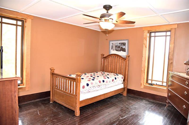 207 Mc Ewen Road Mercer, PA 16137 - Photo 15 of 23 This bedroom is 12x13 and has the original hardwood floors