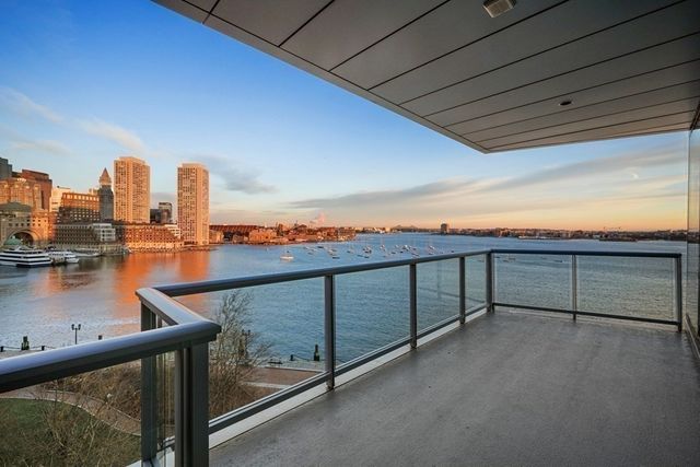 a view of a city skyline from a balcony