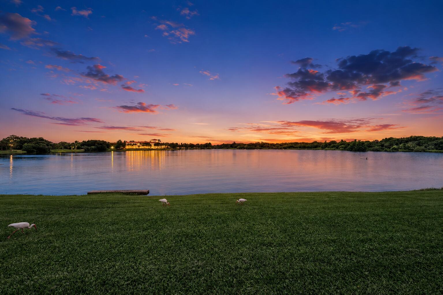 1430 Northwest 48th Lane Boca Raton, FL 33431 - Photo 4 of 54 a view of a lake with houses in the back