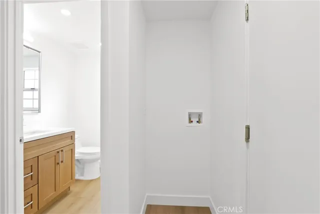 a bathroom with a toilet sink