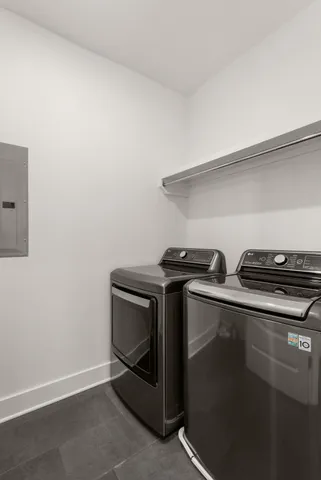 a stove top oven sitting inside of a kitchen