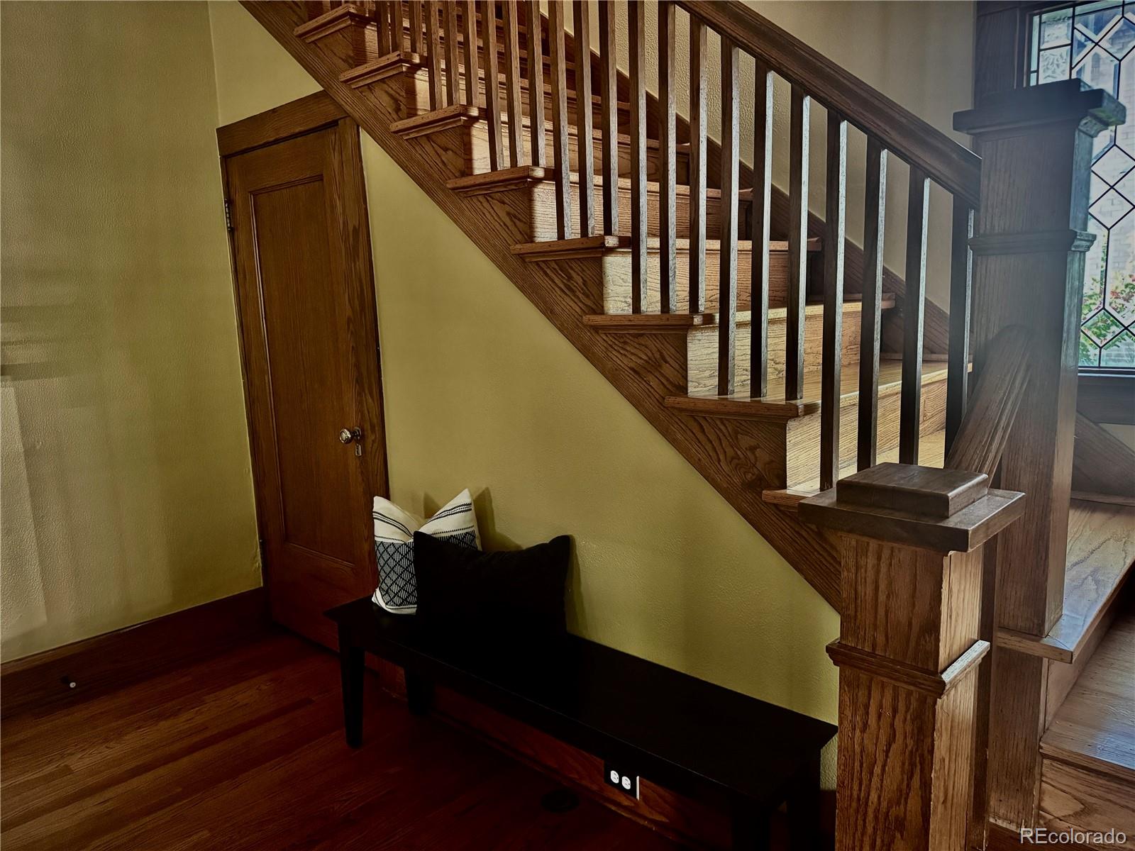 2201 Cherry Street Denver, CO 80207 - Photo 19 of 46 a view of entryway and hall with wooden floor