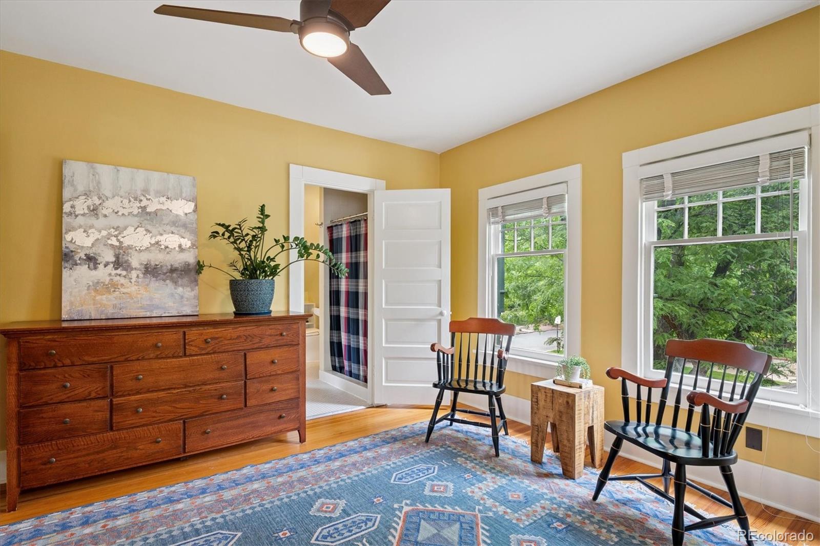 2201 Cherry Street Denver, CO 80207 - Photo 24 of 46 a living room with furniture and a window