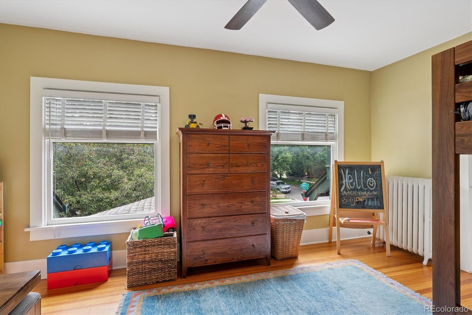2201 Cherry Street Denver, CO 80207 - Photo 25 of 46 a living room with furniture and a window