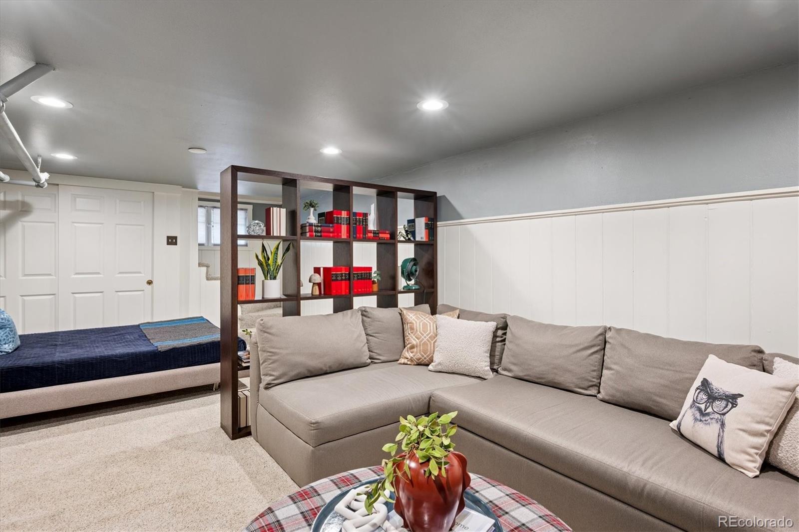 2201 Cherry Street Denver, CO 80207 - Photo 31 of 46 a living room with furniture and a couch