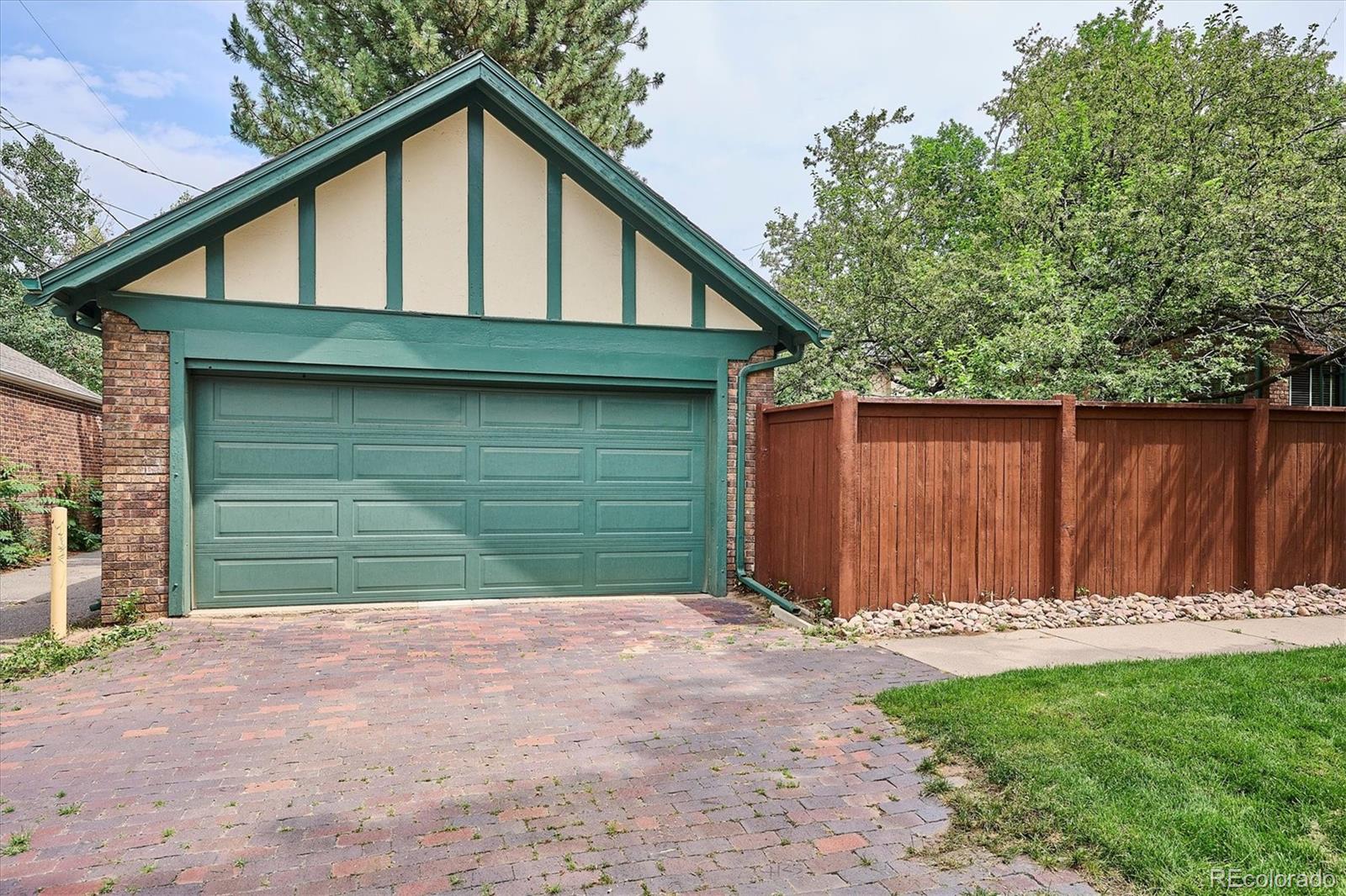 2201 Cherry Street Denver, CO 80207 - Photo 38 of 46 a view of a backyard of the house
