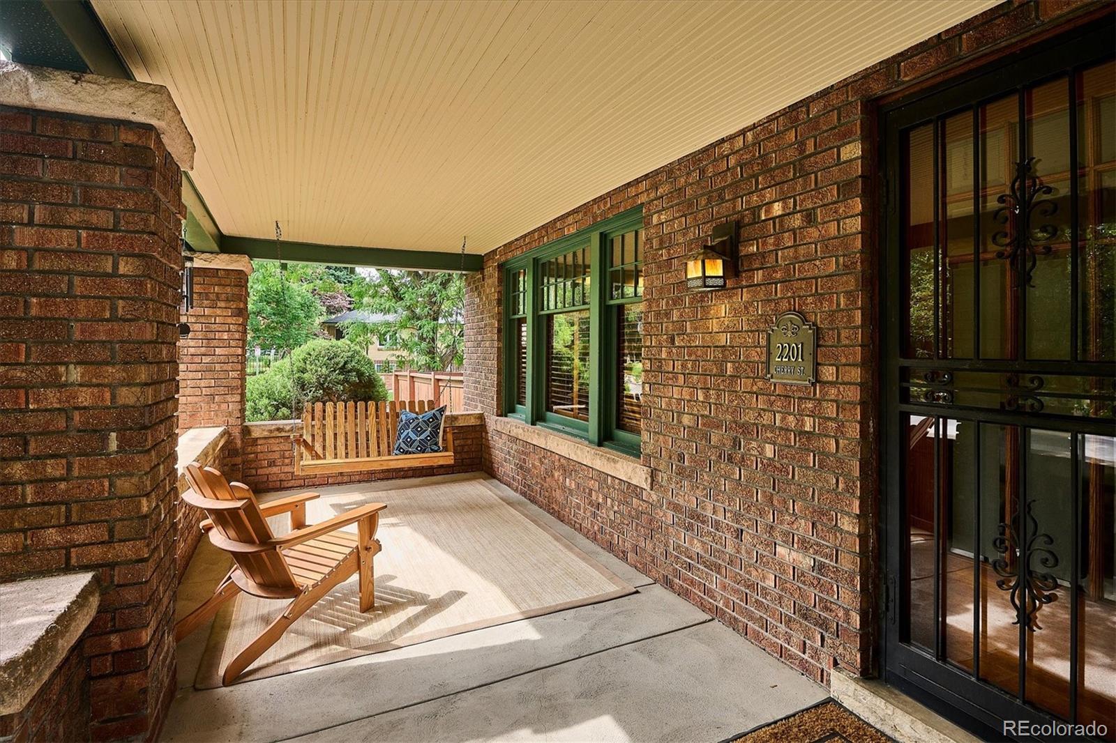 2201 Cherry Street Denver, CO 80207 - Photo 4 of 46 a view of balcony with floor to ceiling windows