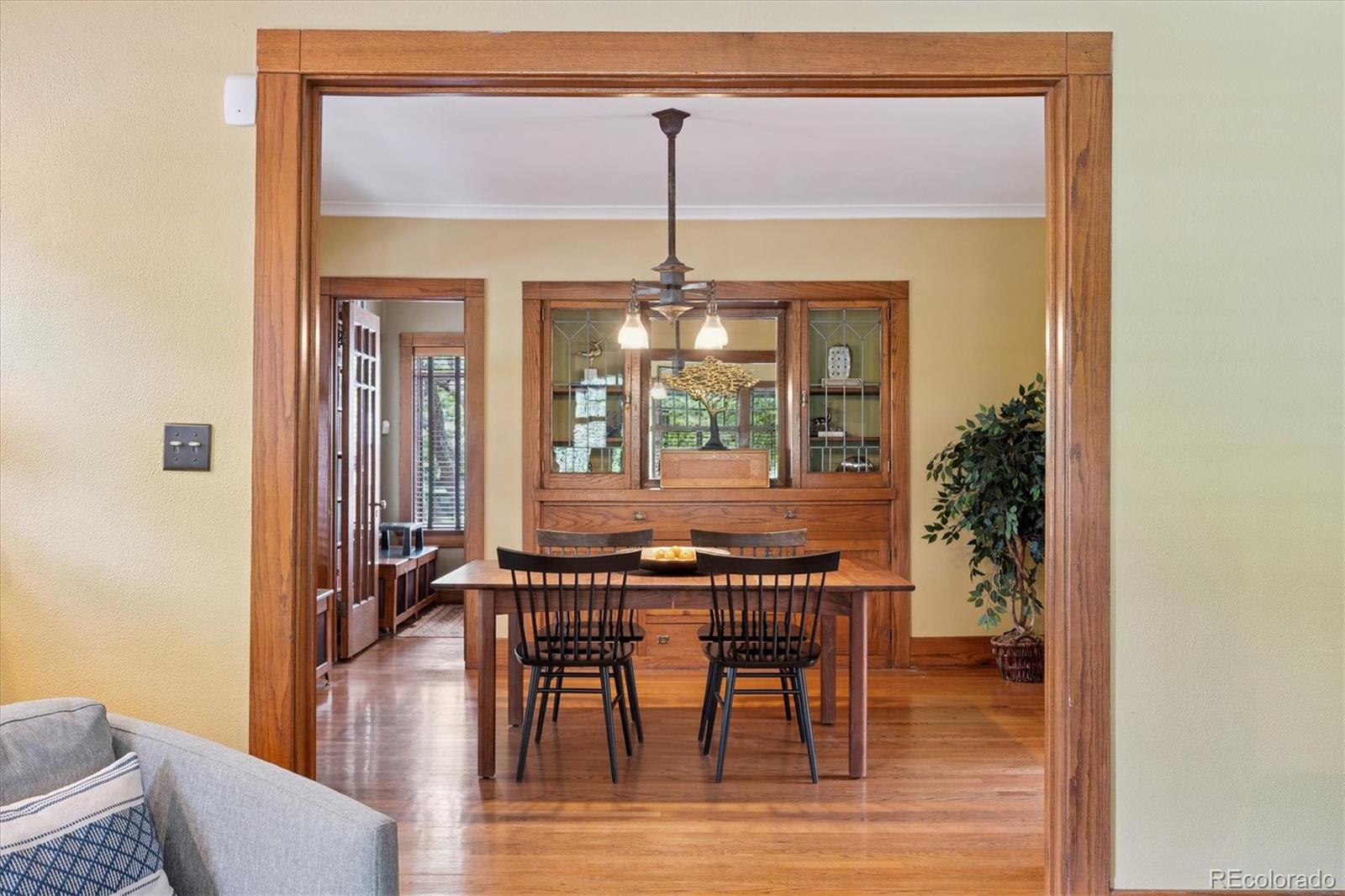 2201 Cherry Street Denver, CO 80207 - Photo 10 of 46 a dining room with table and chairs
